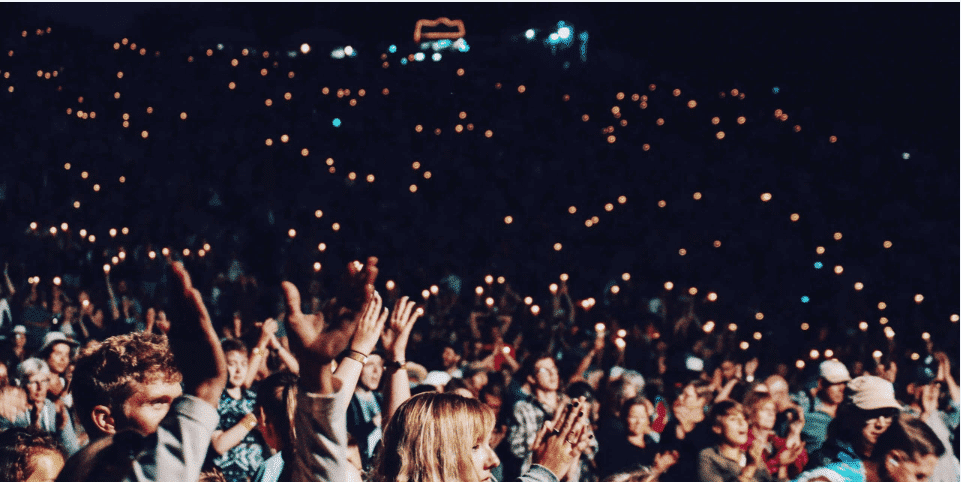 Concert with crowd using smartphones